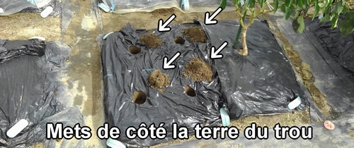 Mets de côté la terre du trou