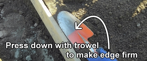 Press down with trowel to make edge firm