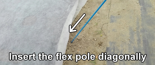 Insert the flexible stakes into the ground